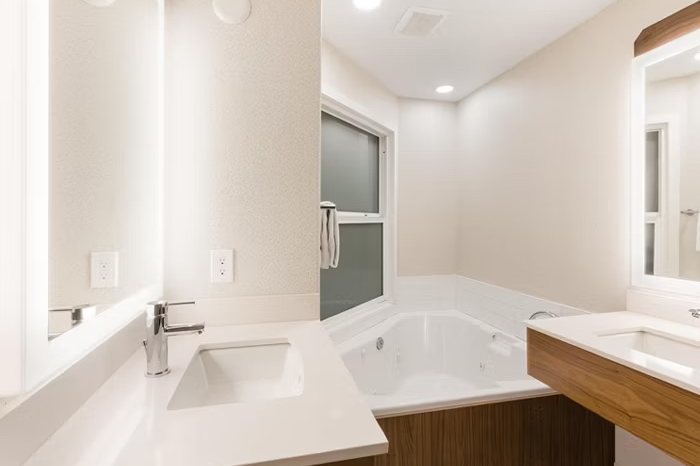 In-room jacuzzi tub in a suite bathroom at Holiday Inn Express Grande Prairie